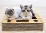 Cat scratch board with toys